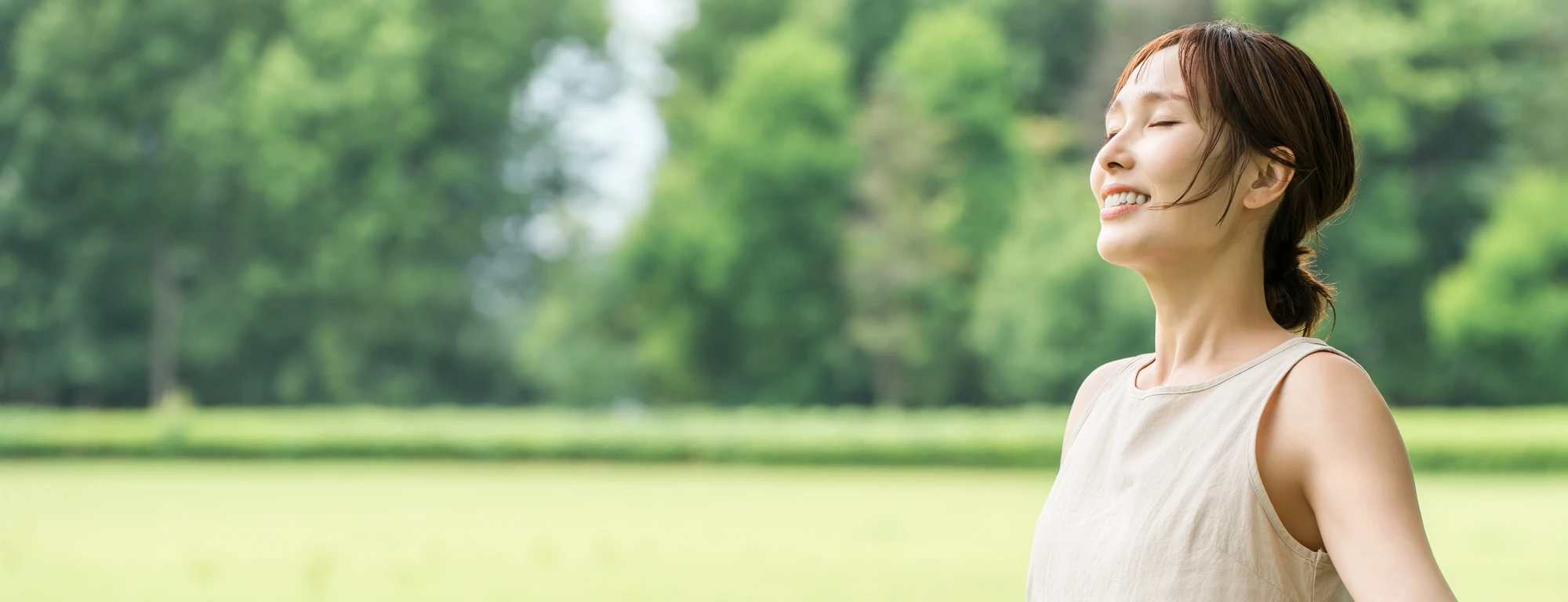Woman enjoying a peaceful moment outdoors